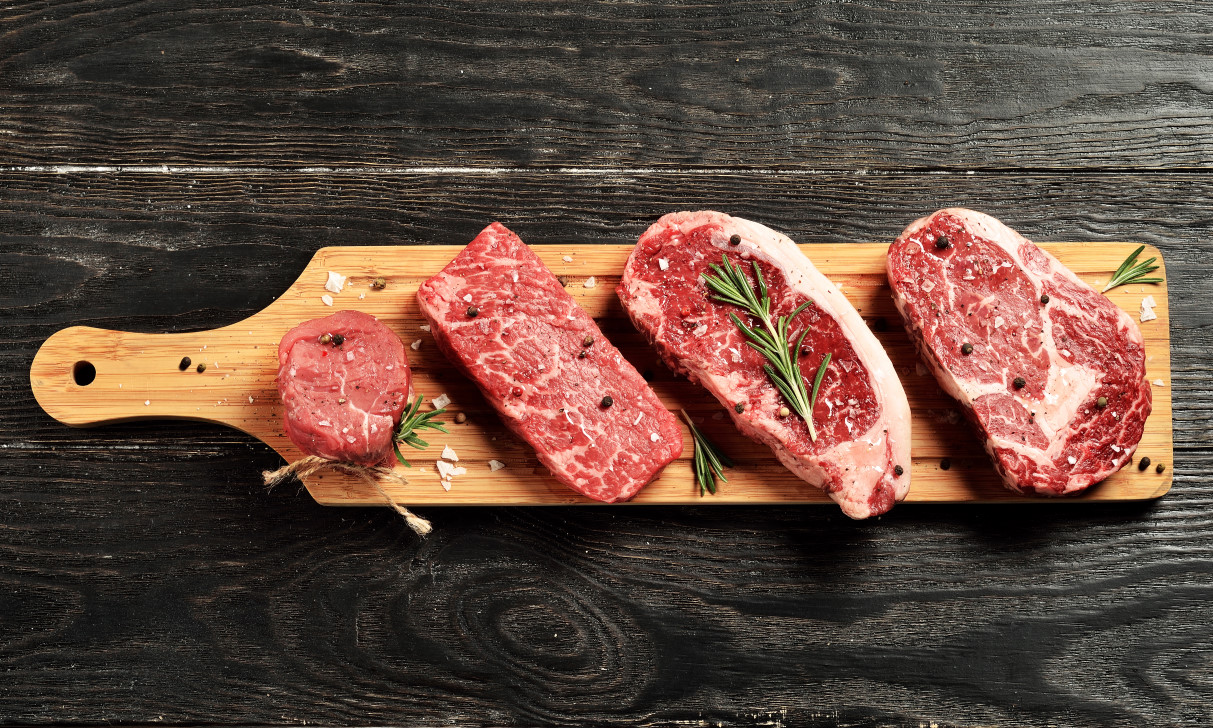 fresh-raw-prime-black-angus-beef-steaks-wooden-board-tenderloin-denver-cut-striploin-rib-eye