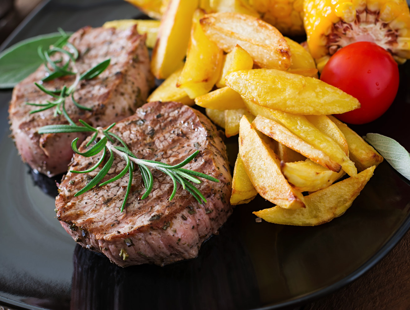 tender-juicy-veal-steak-medium-rare-with-french-fries